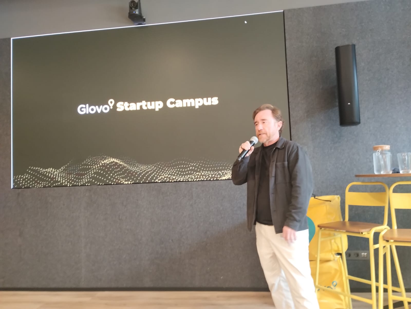 Sacha Michaud, co-founder of Glovo, speaks during the Startup Campus at the company's headquarters in Barcelona. Photo: Jakub Lachert / PTWP